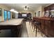 Game room with bar, pool table and adjacent theater room at 608 Tabbystone Nw St, Marietta, GA 30064