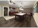 Game room with pool table, bar and hardwood floors at 608 Tabbystone Nw St, Marietta, GA 30064