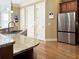 Spacious kitchen featuring granite countertops, stainless steel appliances, and ample cabinet space at 608 Tabbystone Nw St, Marietta, GA 30064