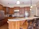 Gourmet kitchen featuring granite countertops, modern appliances, and a spacious island at 608 Tabbystone Nw St, Marietta, GA 30064