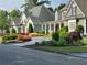 Picturesque street view of elegant homes with well-maintained lawns and colorful flowerbeds at 608 Tabbystone Nw St, Marietta, GA 30064