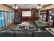 Home theater room features custom shelving, and comfortable leather seating at 608 Tabbystone Nw St, Marietta, GA 30064