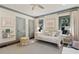 Bright bedroom with daybed, soft colors, and natural light at 615 Wilson Nw Rd, Atlanta, GA 30318
