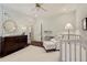 Charming Bedroom with striped walls, white furniture, and hardwood floors at 615 Wilson Nw Rd, Atlanta, GA 30318