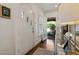 Welcoming entryway with a unique arched front door, hardwood floors, and views into the living area at 615 Wilson Nw Rd, Atlanta, GA 30318