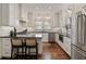 Modern kitchen featuring stainless steel appliances, dark countertops, and classic white cabinets at 615 Wilson Nw Rd, Atlanta, GA 30318
