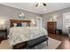 Spacious main bedroom with hardwood floors, ceiling fan, and decorative details at 615 Wilson Nw Rd, Atlanta, GA 30318