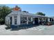 Exterior of vibrant restaurant with covered patio and open entrance at 615 Wilson Nw Rd, Atlanta, GA 30318