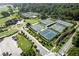 Aerial view of tennis courts with manicured landscaping at 615 Wilson Nw Rd, Atlanta, GA 30318