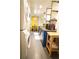 Bright kitchen featuring dining area, stainless steel appliances, and laundry machines in a modern design at 1452 Mercer Ave, Atlanta, GA 30337