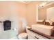 Stylish powder room with a vessel sink, granite countertop, and modern fixtures at 692 Heritage Post Ln, Grayson, GA 30017
