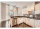 Well-appointed kitchen with granite countertops, stainless steel appliances, and a breakfast nook at 692 Heritage Post Ln, Grayson, GA 30017