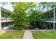 Exterior shot showing the building's facade and landscaping of the building at 986 Greenwood Ne Ave # 4, Atlanta, GA 30306