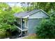 Charming two-story home featuring a welcoming porch and lush landscaping at 986 Greenwood Ne Ave # 4, Atlanta, GA 30306