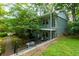 Two-story building featuring balconies, stairs, and a well-maintained lawn at 986 Greenwood Ne Ave # 4, Atlanta, GA 30306