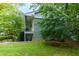 Two-story building with a brick facade, balconies, and a well-maintained lawn at 986 Greenwood Ne Ave # 4, Atlanta, GA 30306
