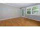 Bright, sunlit living room featuring hardwood floors and neutral-toned walls at 986 Greenwood Ne Ave # 4, Atlanta, GA 30306