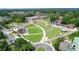 This is a beautiful aerial view of the community amphitheater and surrounding area at 116 Via Roma, Woodstock, GA 30188