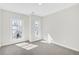 Bedroom with ample natural light from two large windows at 116 Via Roma, Woodstock, GA 30188