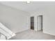Carpeted bedroom featuring double doors and nearby hallways at 116 Via Roma, Woodstock, GA 30188