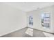 Comfortable bedroom with natural light from two large windows at 116 Via Roma, Woodstock, GA 30188