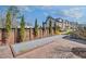 Enjoy a game of bocce ball on this court surrounded by lush landscaping and upscale townhomes at 116 Via Roma, Woodstock, GA 30188