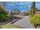 Beautiful common area with a bocce ball court, gazebo, and lush landscaping at 116 Via Roma, Woodstock, GA 30188