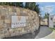 Elegant stone sign for Tuscany Village community at 116 Via Roma, Woodstock, GA 30188