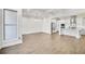 Open concept living space includes a modern kitchen with a large island and stainless steel appliances at 116 Via Roma, Woodstock, GA 30188