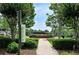 Beautiful park with lush greenery, benches, and walkways creating a serene and inviting outdoor space at 116 Via Roma, Woodstock, GA 30188