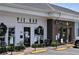 Charming storefront featuring Pie Bar and Beautymark Studio with outdoor seating at 116 Via Roma, Woodstock, GA 30188