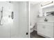 Bright bathroom with a glass shower, vanity with storage, and modern fixtures at 2716 Suwanee Se Way, Marietta, GA 30067