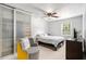 Bedroom features natural light, seating area and wardrobe storage at 2716 Suwanee Se Way, Marietta, GA 30067