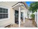 Cozy front entrance with a concrete patio, covered entrance, and neutral-colored siding at 2716 Suwanee Se Way, Marietta, GA 30067