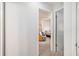 Hallway view leading to a bright bedroom with seating area at 2716 Suwanee Se Way, Marietta, GA 30067