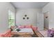 Bright bedroom with large window for natural light and plenty of closet space at 6237 Thorncrest Dr # 10, Tucker, GA 30084