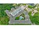 Aerial view highlighting the complex's rooftop parking and sparkling pool area at 10 Perimeter Summit Ne Blvd # 3109, Atlanta, GA 30319