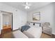 Cozy bedroom with a queen bed, en-suite bathroom, closet, and beach-themed decor at 10 Perimeter Summit Ne Blvd # 3109, Atlanta, GA 30319