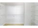 Walk-in closet with built-in shelving; optimal storage solutions at 10 Perimeter Summit Ne Blvd # 3109, Atlanta, GA 30319