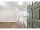 Inviting entryway with wood-look floors and neutral walls, leading into an open floorplan at 10 Perimeter Summit Ne Blvd # 3109, Atlanta, GA 30319
