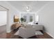 Comfortable living room featuring hardwood floors, a ceiling fan, and plenty of natural light at 10 Perimeter Summit Ne Blvd # 3109, Atlanta, GA 30319