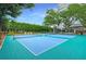 Aerial view of inviting pickleball courts framed by green trees and landscaping at 10 Perimeter Summit Ne Blvd # 3109, Atlanta, GA 30319
