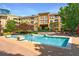 Beautiful community pool with lounge chairs and manicured landscaping offers a perfect outdoor retreat at 10 Perimeter Summit Ne Blvd # 3109, Atlanta, GA 30319