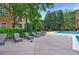 Community pool with lounge seating offers a great spot for relaxation amidst lush landscaping at 10 Perimeter Summit Ne Blvd # 3109, Atlanta, GA 30319