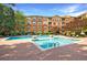 Beautiful community pool surrounded by lush landscaping and lounge chairs in a courtyard setting at 10 Perimeter Summit Ne Blvd # 3109, Atlanta, GA 30319