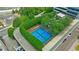 Overhead view of rooftop pickleball courts, surrounded by lush green hedges at 10 Perimeter Summit Ne Blvd # 3109, Atlanta, GA 30319