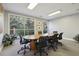 Well-appointed conference room featuring a large table and natural light, ideal for meetings and collaboration at 10 Perimeter Summit Ne Blvd # 3109, Brookhaven, GA 30319