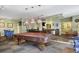 Spacious game room with a pool table, foosball, and comfortable seating for residents to enjoy at 10 Perimeter Summit Ne Blvd # 3109, Brookhaven, GA 30319
