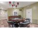 Cozy game room featuring poker table and kitchenette at 10 Perimeter Summit Ne Blvd # 3109, Brookhaven, GA 30319