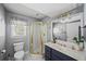 Bathroom with a glass-enclosed shower, modern vanity, and stylish fixtures, providing a clean aesthetic at 4281 Chimney Lake Ne Dr, Roswell, GA 30075